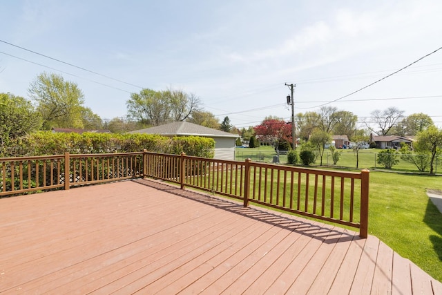 wooden deck with a yard