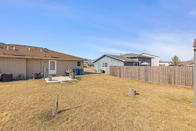 view of yard with a patio and fence