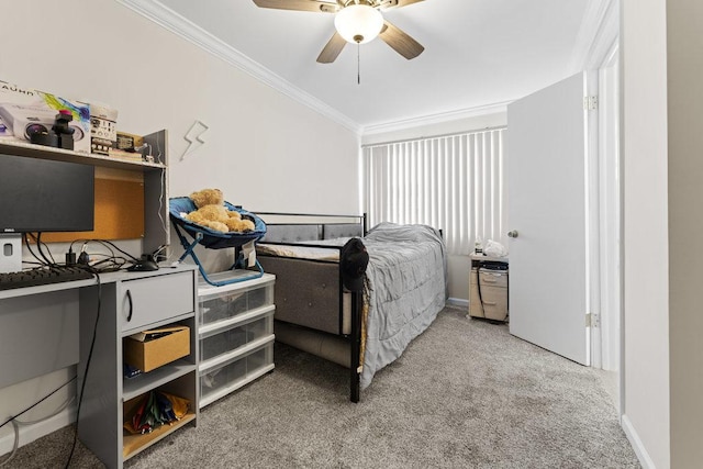 bedroom with crown molding, baseboards, carpet floors, and ceiling fan