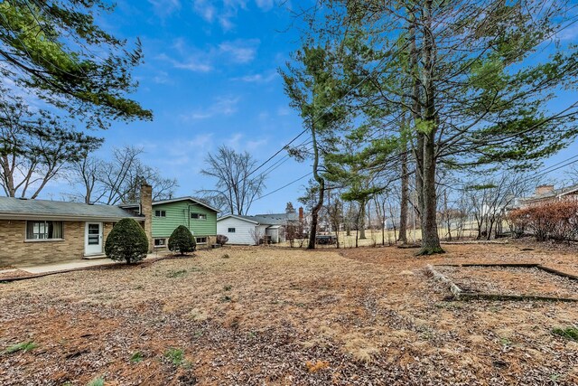 view of yard with a patio area