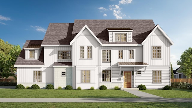 view of front facade featuring brick siding, board and batten siding, and a front lawn