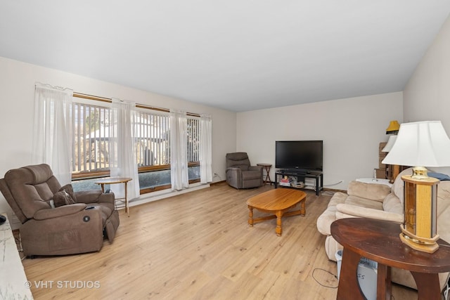 living area featuring light wood-style floors