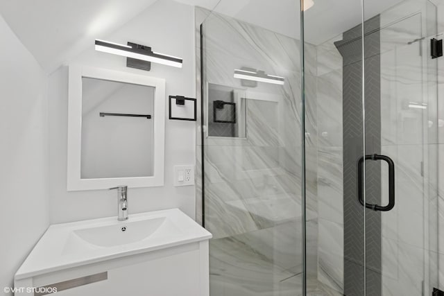 full bathroom with vanity and a shower stall