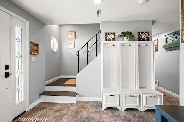 mudroom with visible vents and baseboards