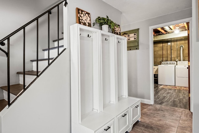 mudroom with separate washer and dryer