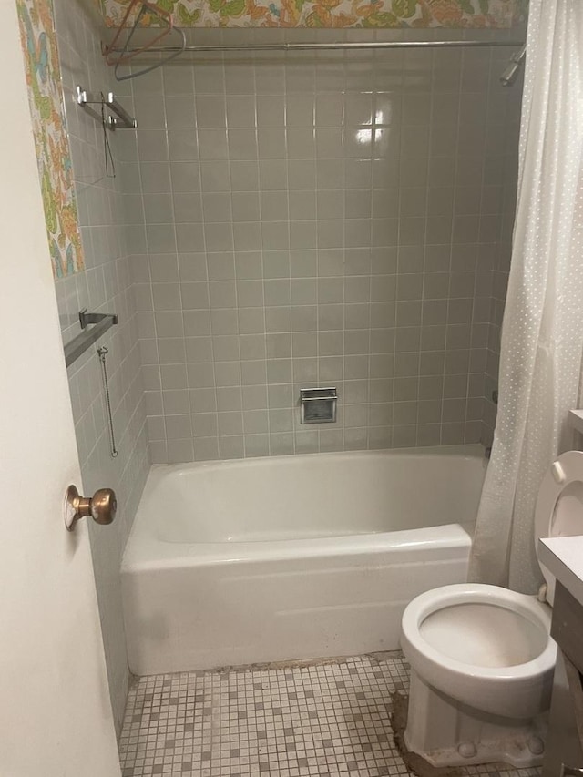 bathroom with toilet, shower / bath combo, vanity, and tile patterned flooring