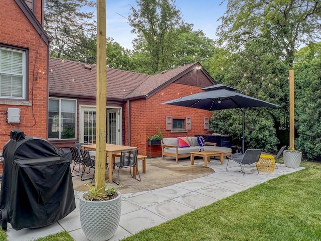 view of patio featuring area for grilling, outdoor dining area, and an outdoor hangout area