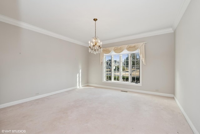 empty room featuring an inviting chandelier, baseboards, carpet, and ornamental molding