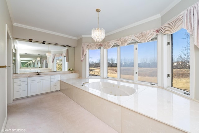 full bathroom featuring a notable chandelier, vanity, crown molding, and a whirlpool tub