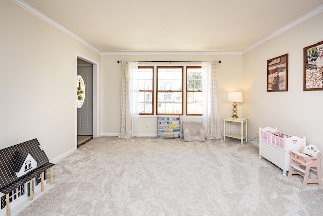 rec room with baseboards, carpet floors, and crown molding