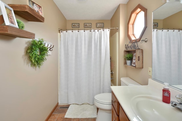 bathroom with vanity, a shower with shower curtain, baseboards, visible vents, and toilet