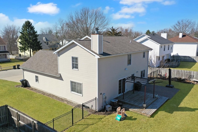 view of side of property with a lawn, a pergola, a fenced backyard, and a chimney