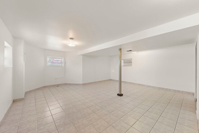 4556 N Newcastle Ave, Harwood Heights, IL 60706 - below grade area featuring light tile patterned flooring and baseboards
