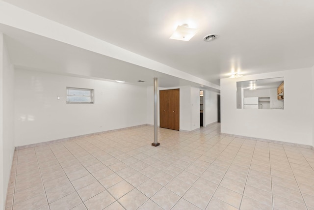 4556 N Newcastle Ave, Harwood Heights, IL 60706 - finished below grade area with light tile patterned floors and baseboards