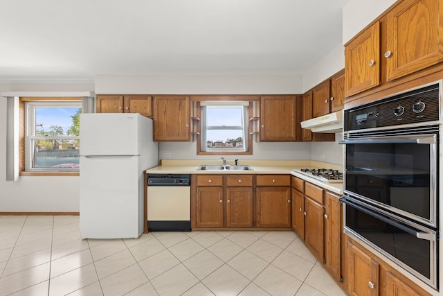 4556 N Newcastle Ave, Harwood Heights, IL 60706 - kitchen with white appliances, a sink, under cabinet range hood, and brown cabinets