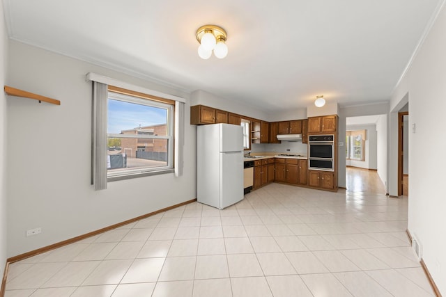 4556 N Newcastle Ave, Harwood Heights, IL 60706 - kitchen with white appliances, under cabinet range hood, a sink, a warming drawer, and light countertops
