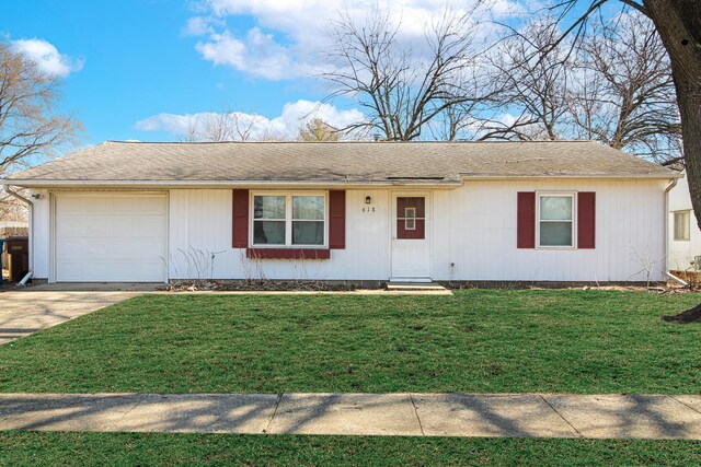 single story home featuring a garage, concrete driveway, and a front lawn