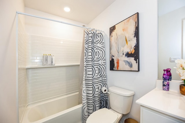 full bath with vanity, shower / tub combo, and toilet