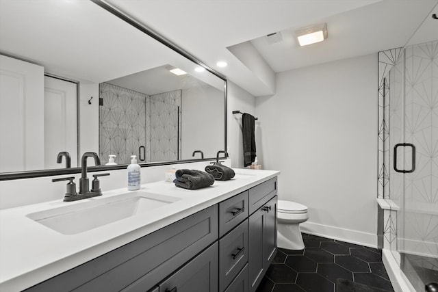 full bathroom featuring tile patterned floors, double vanity, a shower stall, and a sink