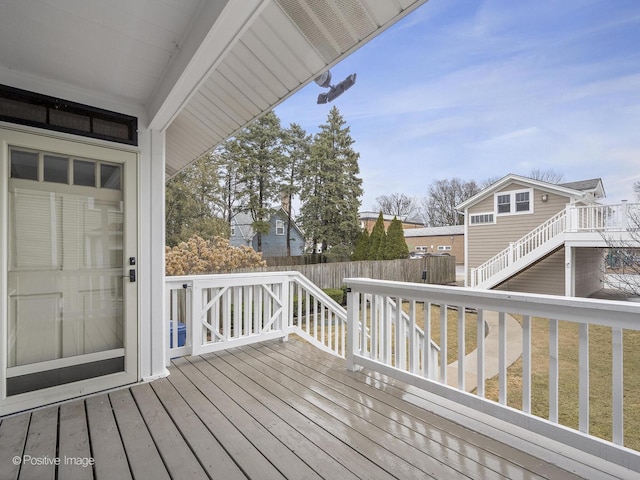 deck with stairway and fence