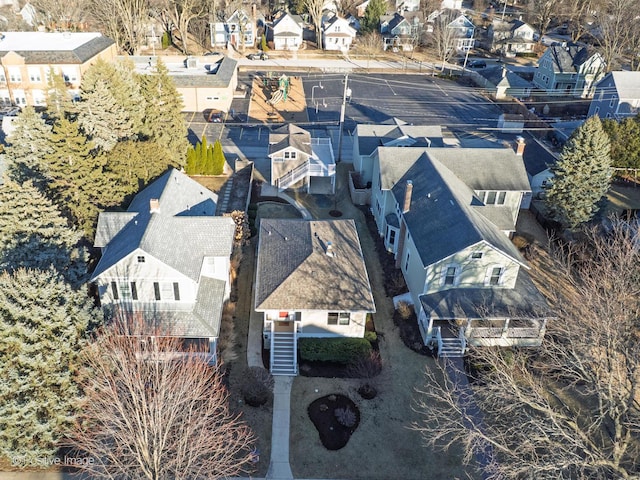 birds eye view of property with a residential view