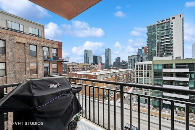 balcony with grilling area and a view of city