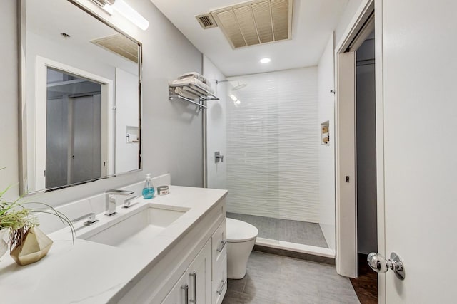 full bathroom featuring visible vents, toilet, a stall shower, and vanity