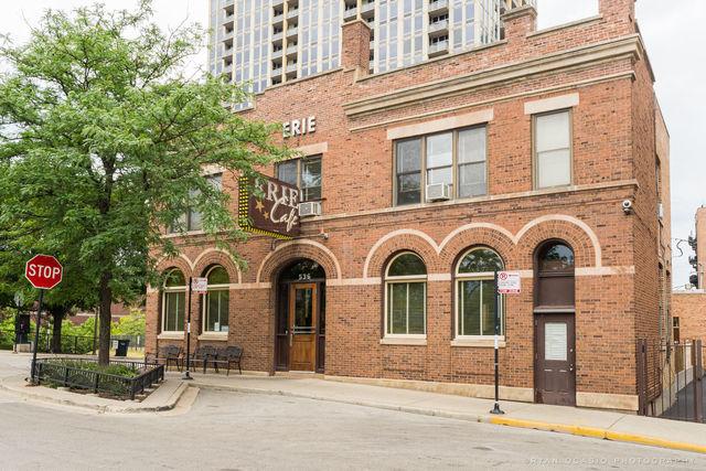 view of building exterior with cooling unit