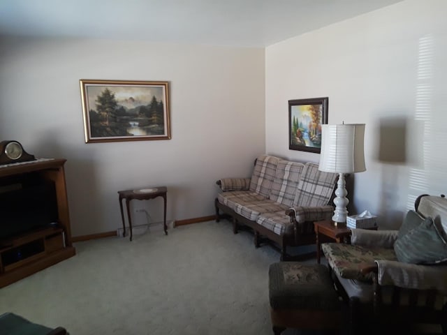 living room with baseboards and carpet floors