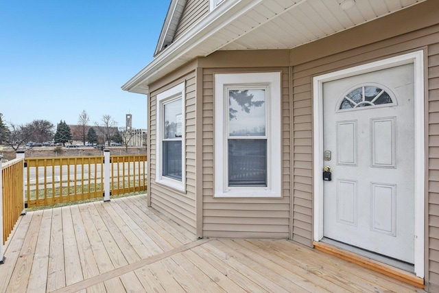 entrance to property featuring a deck