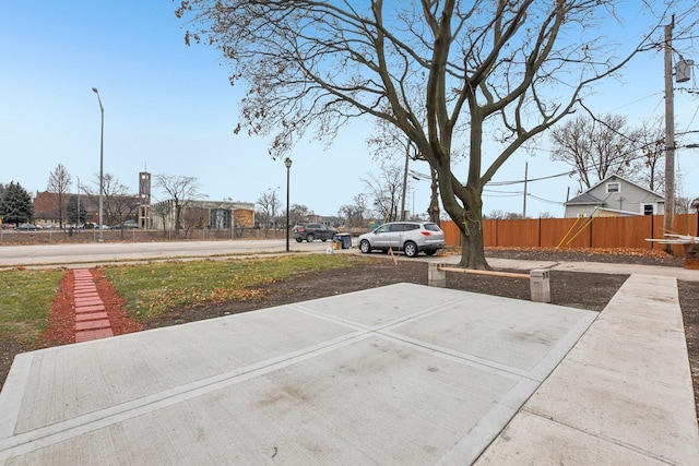 view of patio / terrace featuring fence