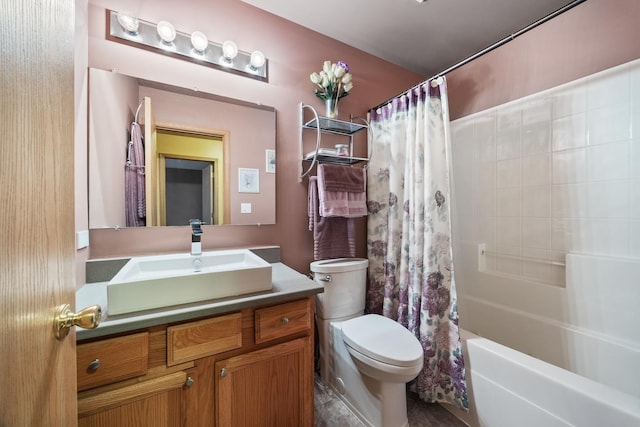 full bath with toilet, vanity, and shower / bath combination with curtain