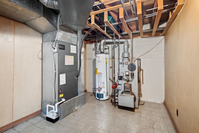 utility room featuring water heater, heating unit, and a heating unit