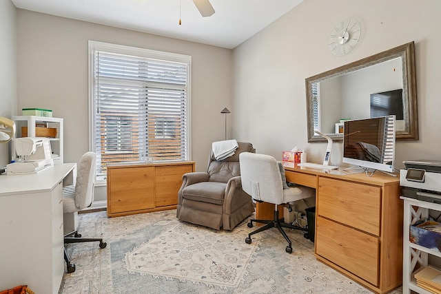 office area with a ceiling fan