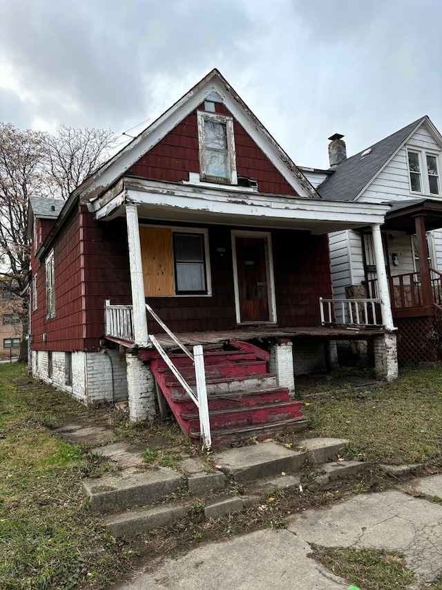 bungalow-style home with covered porch