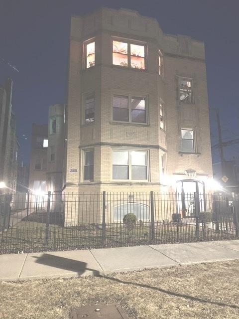 view of property featuring a fenced front yard