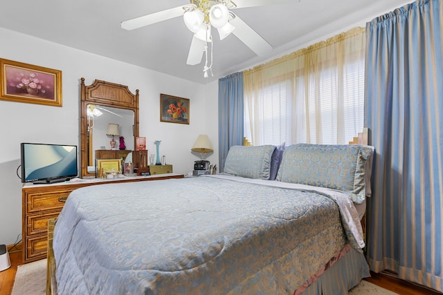 bedroom featuring ceiling fan and light wood-style floors