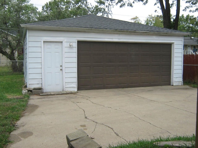 detached garage with fence