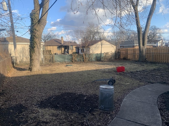 view of yard featuring a fenced backyard