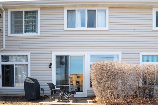 back of house featuring a patio