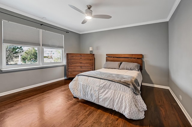 bedroom featuring wood finished floors, baseboards, and ornamental molding