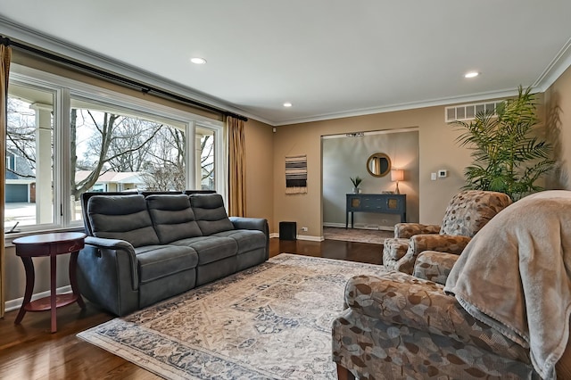 living room featuring plenty of natural light, crown molding, baseboards, and dark wood-style flooring