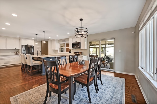 dining area with recessed lighting, visible vents, baseboards, and dark wood-style flooring