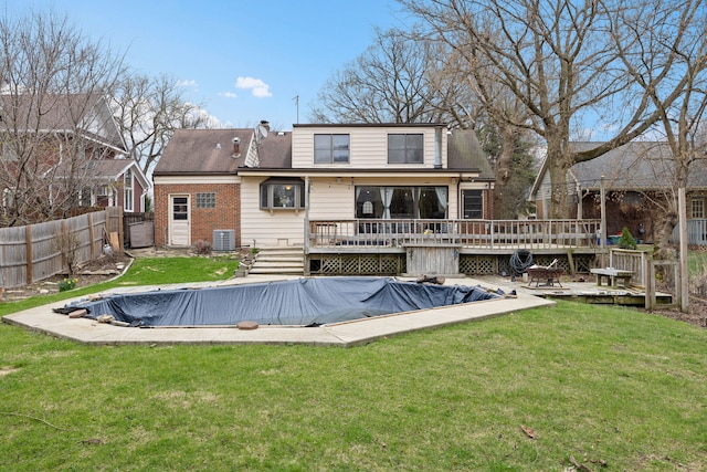 4708 Lawn Ave, Western Springs, IL 60558 - rear view of house featuring a fenced in pool, a yard, a deck, and a fenced backyard