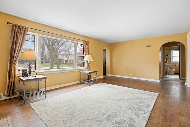 4708 Lawn Ave, Western Springs, IL 60558 - interior space featuring visible vents, a wealth of natural light, arched walkways, and baseboards