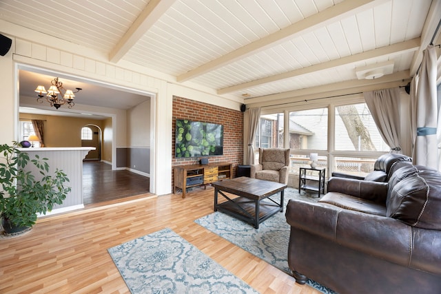 4708 Lawn Ave, Western Springs, IL 60558 - living area featuring beam ceiling, an inviting chandelier, and wood finished floors