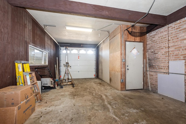 garage with wood walls