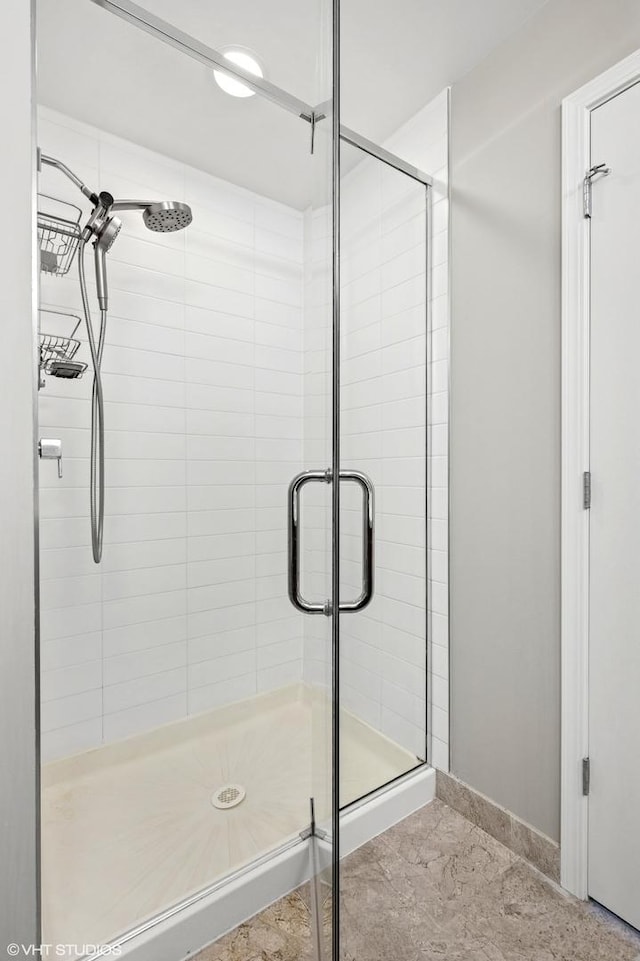 full bath featuring a stall shower