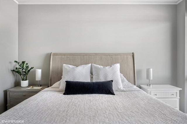 bedroom featuring ornamental molding