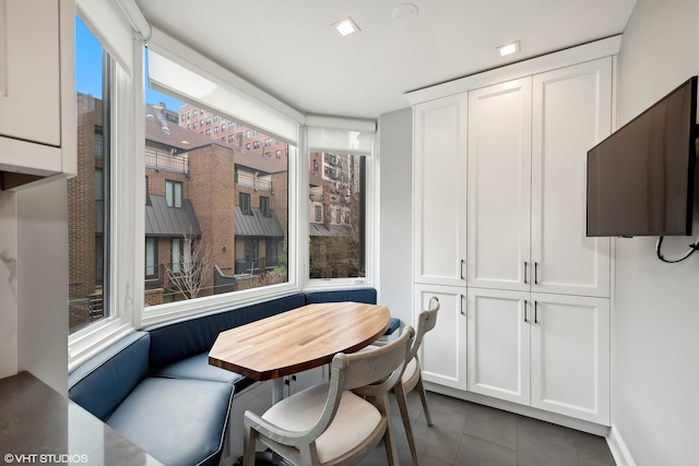 tiled dining space with breakfast area